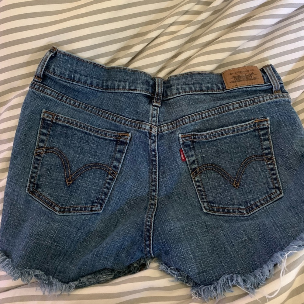 Levi’s Leo 505s shorts. Distressed look. Size 6